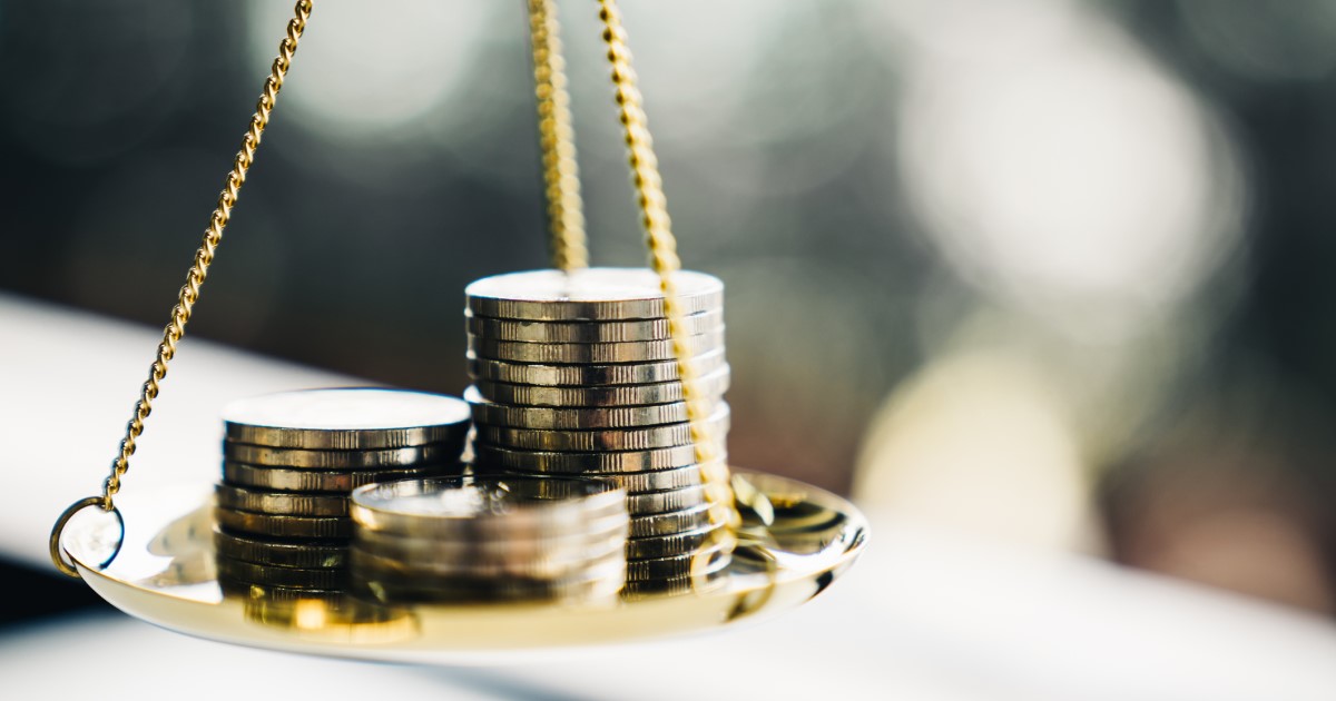 Scale of Justice with coins