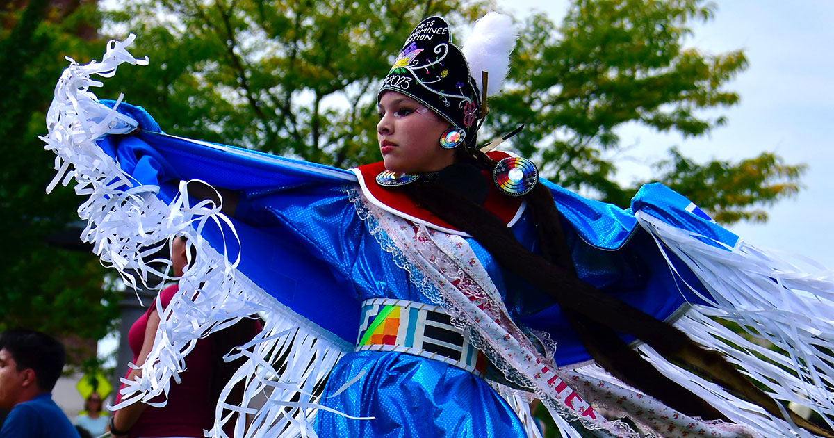 Miss Menominee Nation 2022 fancy dances during the Neenah-Menasha Inter-Tribal Pow Wow. Photo by Sadie Cheyenne Wilson, ©2022 Sadie Cheyenne Photography
