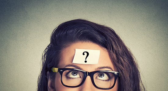 woman with question mark on forehead