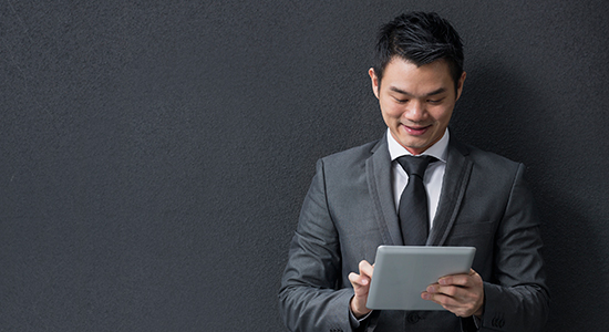 businessman working on tablet