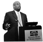 Assistant District Attorney Derek Mosley (pictured) acted out a sentencing hearing based on an actual case involving homicide by intoxicated use of a motor vehicle as part of the third annual Courts and the Media seminar in Milwaukee.