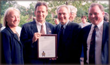 Photo: From left: State Bar President Pat Ballman; Rep. Mark Green, who was recognized for his assistance in procuring a federal district court in Green Bay; Past President Gerry Mowris; and President-elect George Burnett.