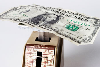 Money on a scale