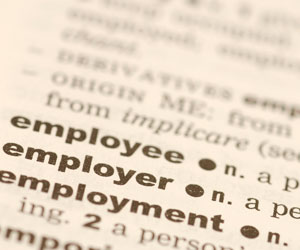Supreme court divided on whether   at-will employment precludes payment of   benefits