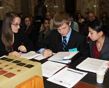 Students reviewing documents.