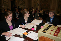 Students reviewing documents.